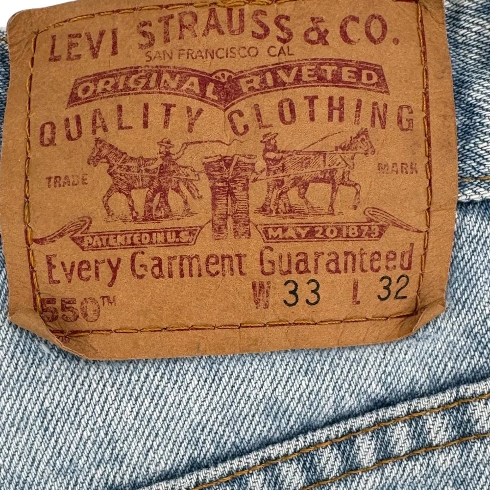 Vintage 2001 Levi's 550 Relaxed Tapered Jeans Tagged 33x31 Light Wash Y2K